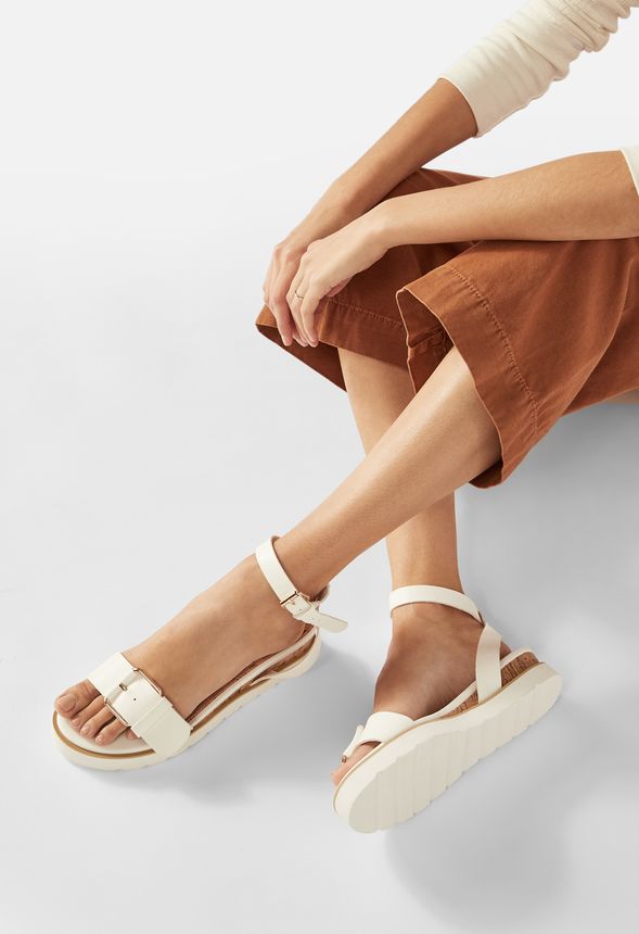 Off Duty Flat Sandal in White - Get great deals at JustFab
