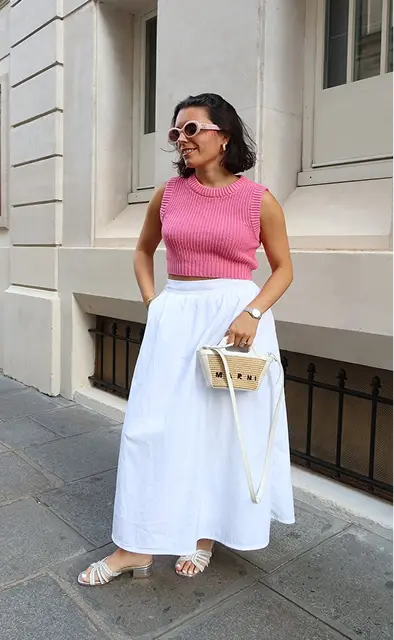 Customer showing off beige heeled shoes